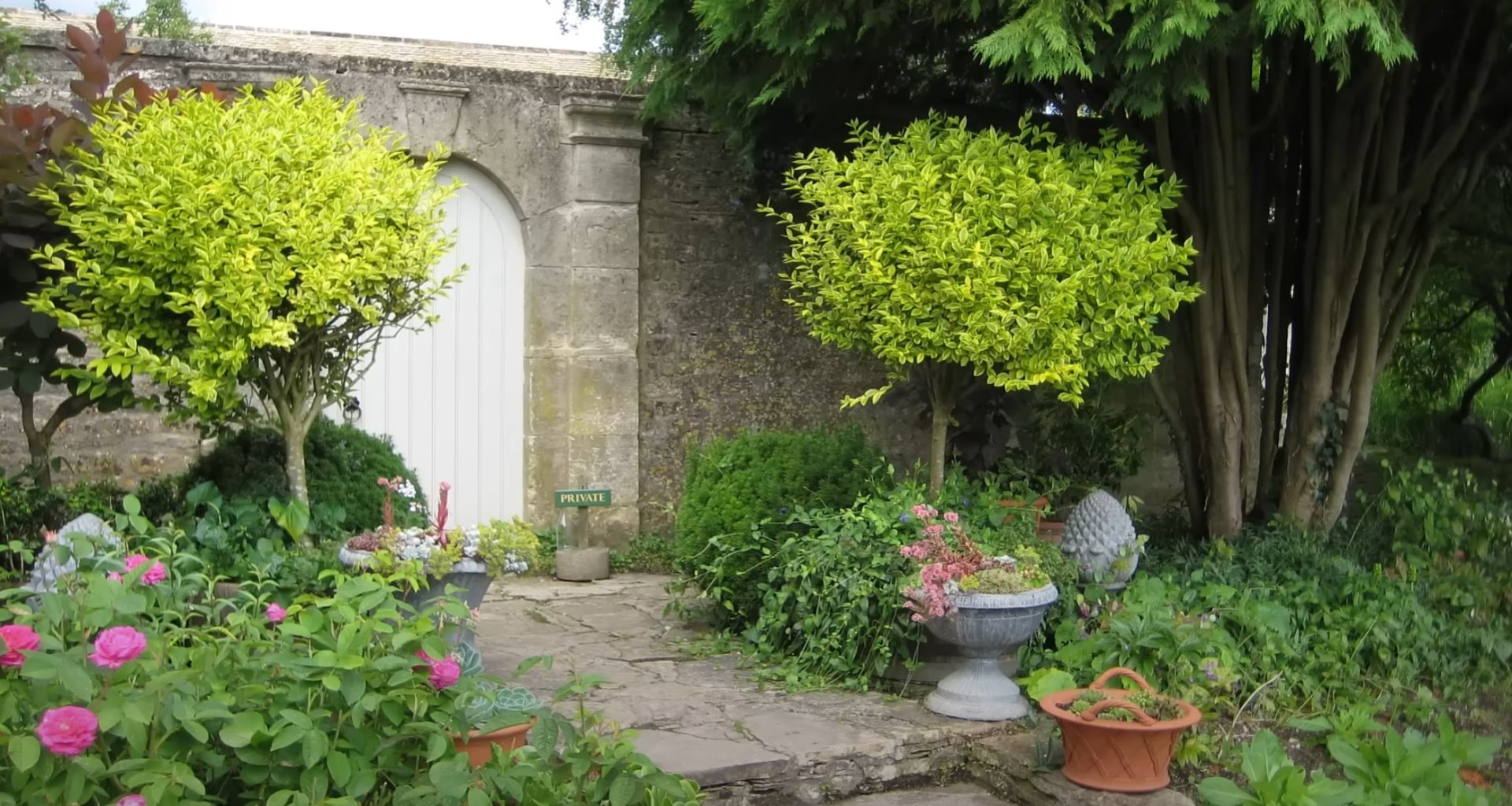 Professional grass selection and lawn installation for optimal regional performance Traditional English garden with lush lawns and established plantings