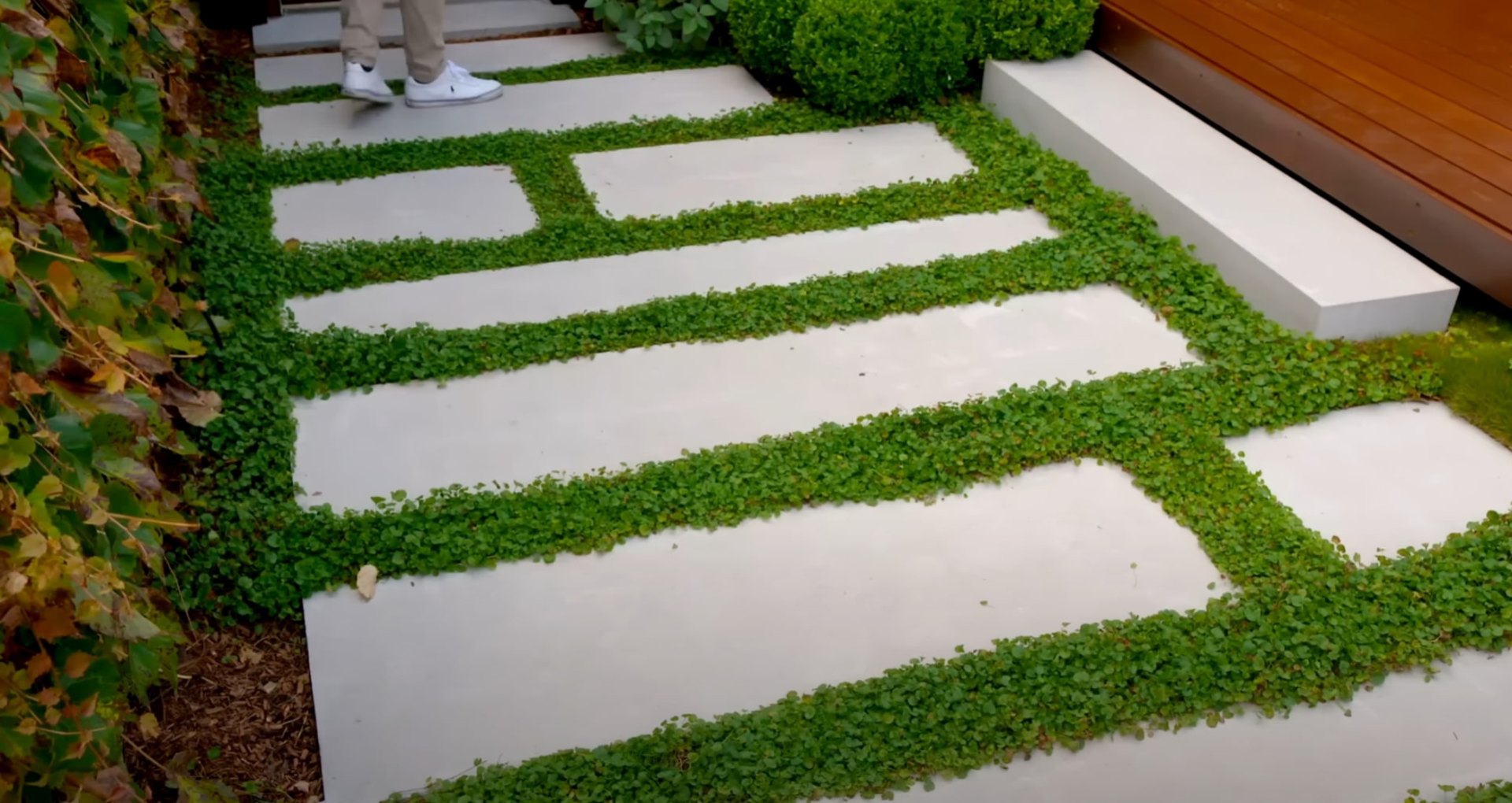 Professional landscape installation process and project management Modern landscape design with geometric patterns and professional installation